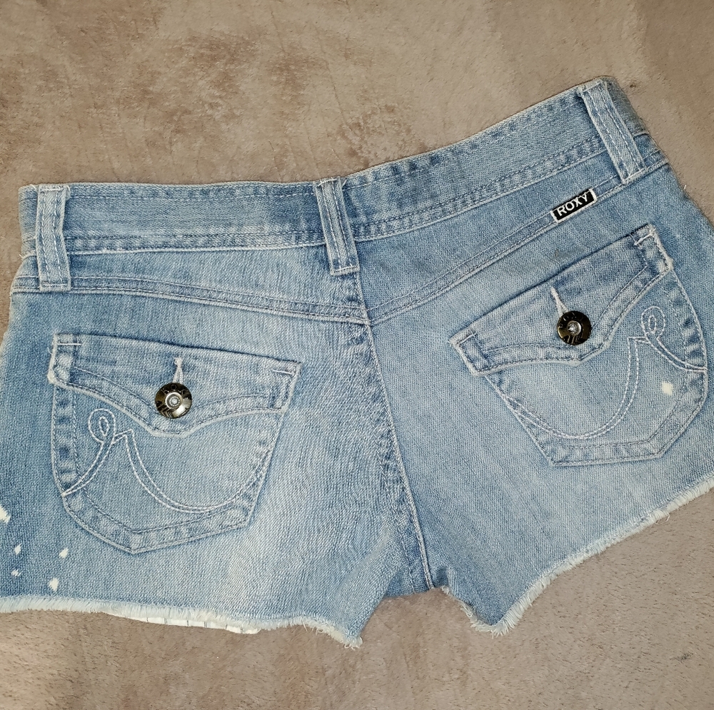 Roxy | Distressed Bleached Jean Shorts with Raw hem.  Medium Wash Womens Size 1